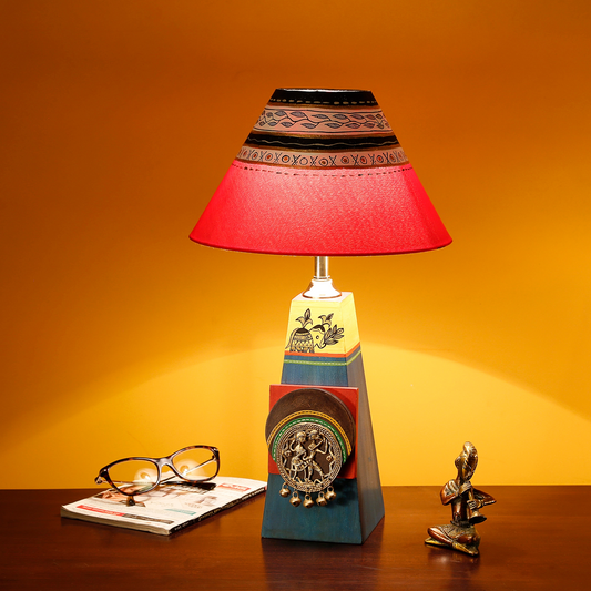 Embellished Lamp with Dhokra Brass Tiles & Red Shade, styled on a desk