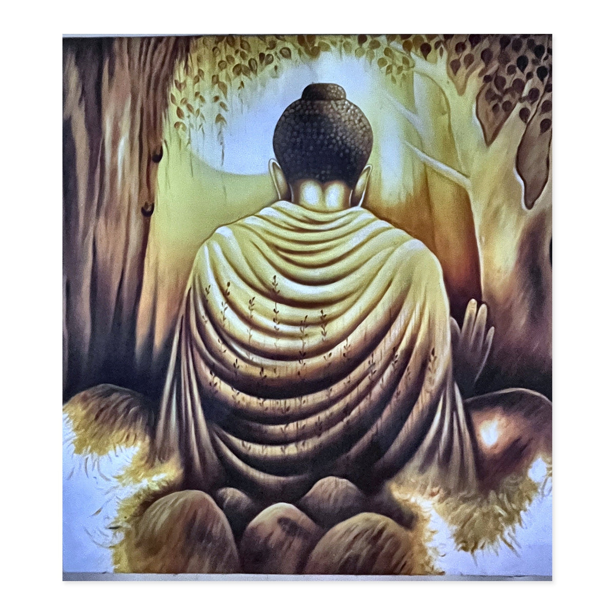 Hand-painted golden Buddha meditation canvas seen from behind beneath a tree