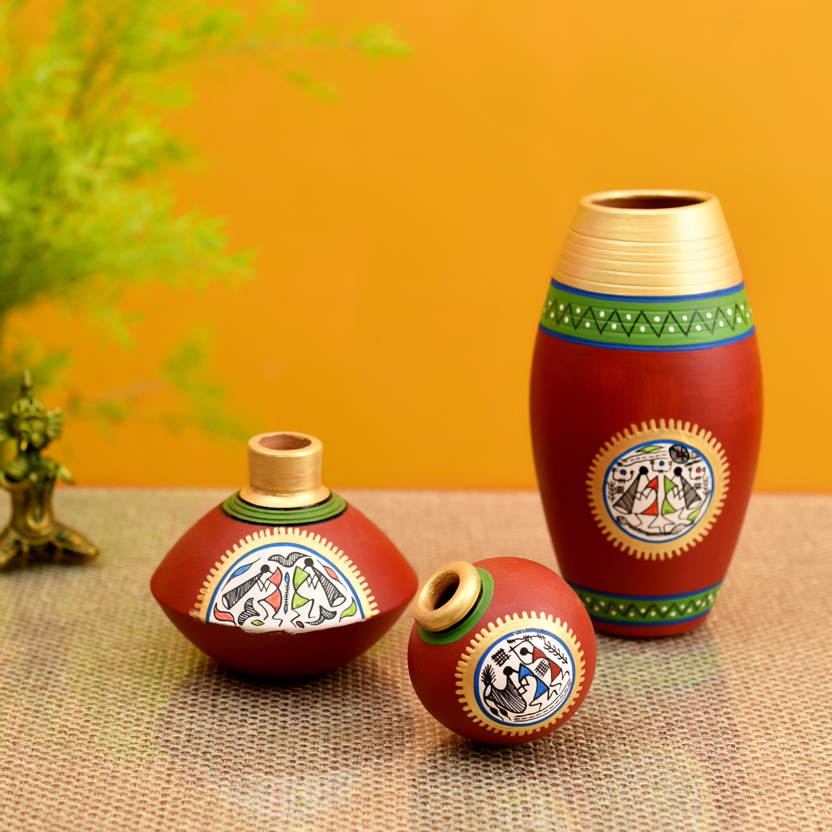 Handcrafted Terracotta Warli Vases, Set of 3, styled on a table