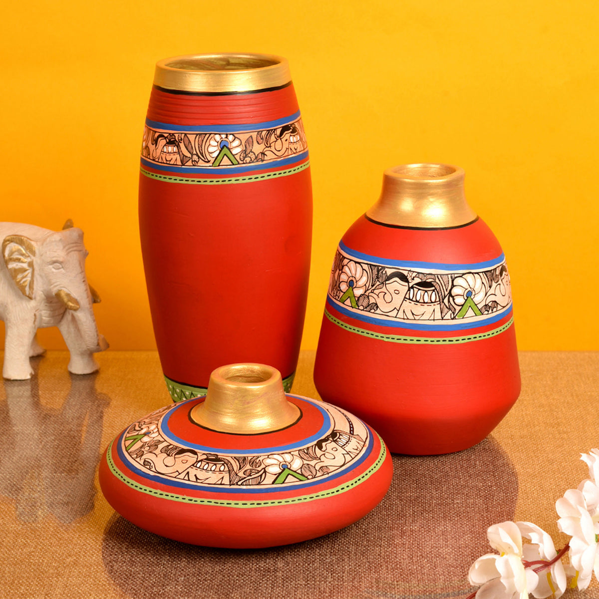Vase Earthen Red Madhubani (Set of 3), styled on a table